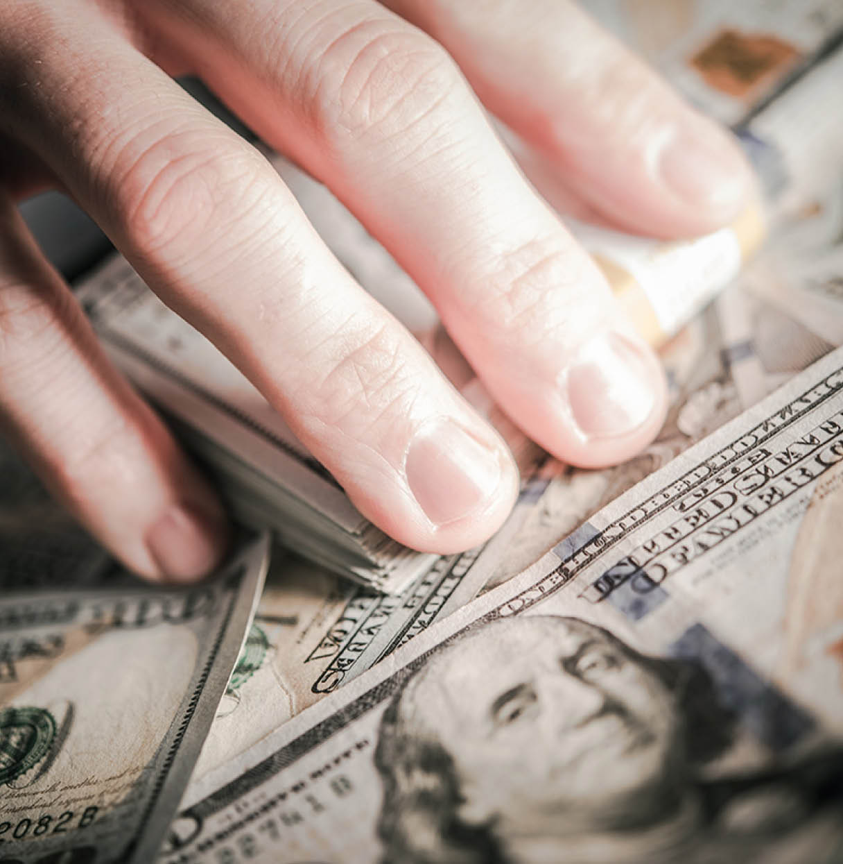 Hands on the Money  Corruption Concept  Caucasian Male Hands Grabbing American One Hundred Dollar Banknotes 