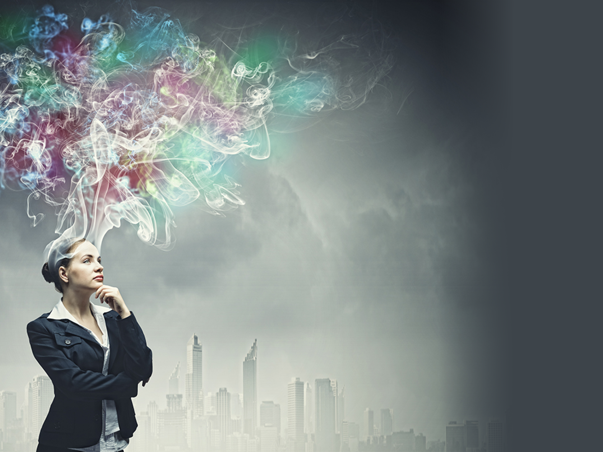 Thoughtful businesswoman with colorful fumes above head