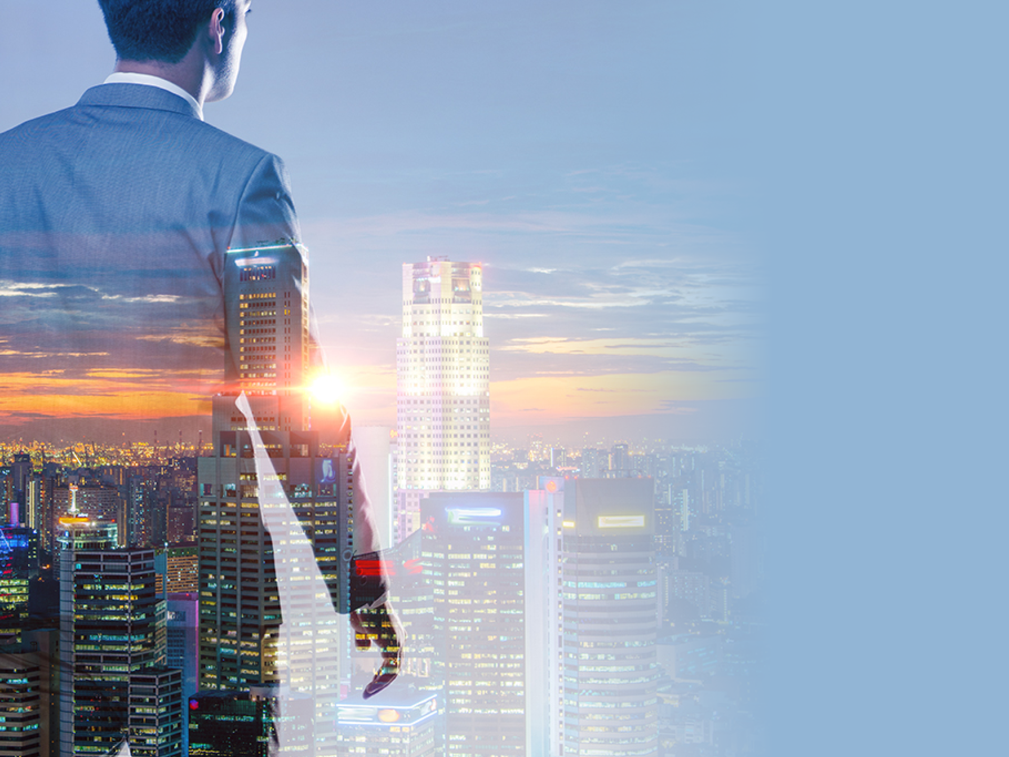 The successful businessman against cityscape in business concept