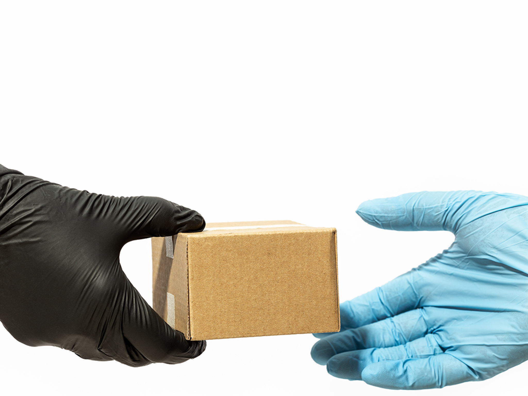 Home delivery during Coronavirus COVID-19 pandemic concept  Hand of Delivery man giving a package to the customer