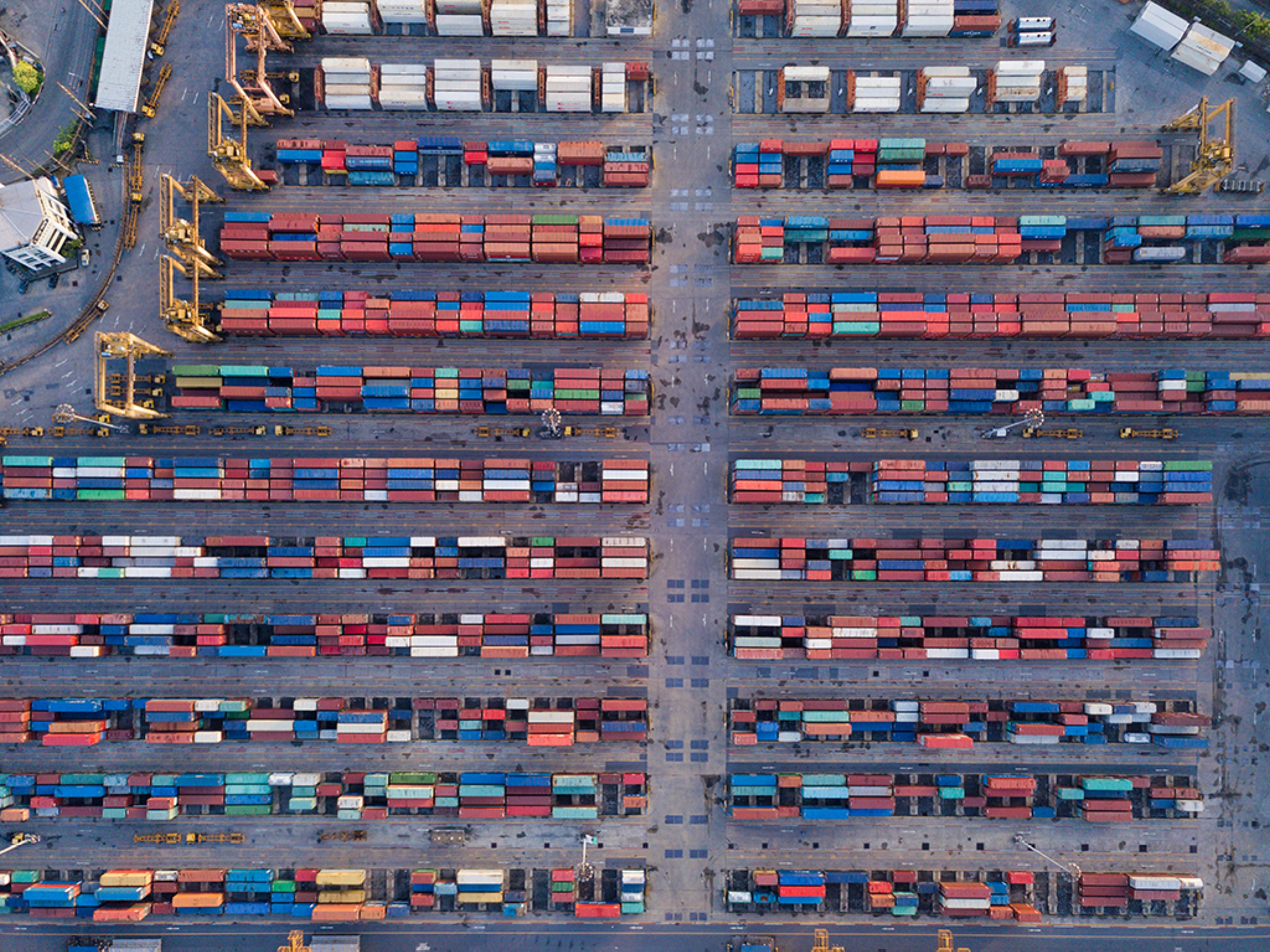 Aerial top view of container cargo ship in the export and import business and logistics international goods in urban city  Shipping cargo to the harbor by crane 