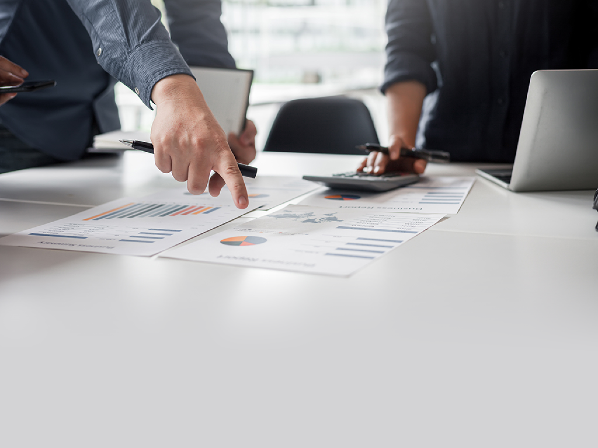 Teamwork of business people Financial data graph analysis On the table in the meeting room.