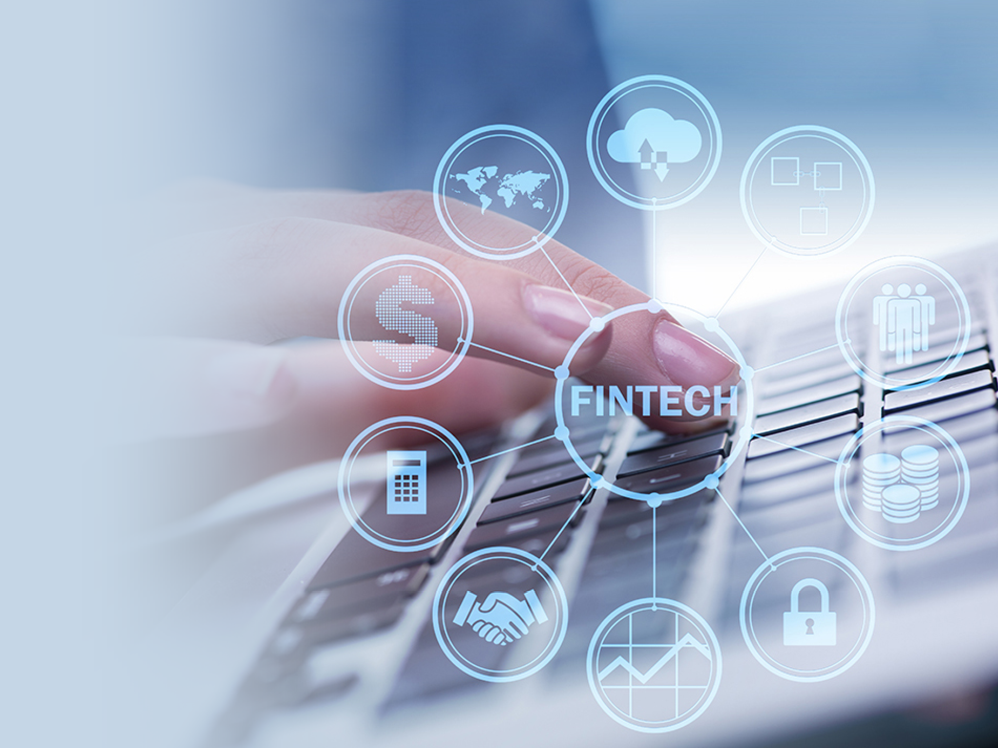 Hands working on laptop in financial technology fintech concept
